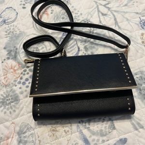 Small crossbody purse with cellphone window.